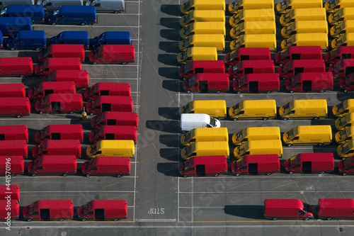 UK, Essex, Purfleet Docks, Aerial view of rows of colorful vans