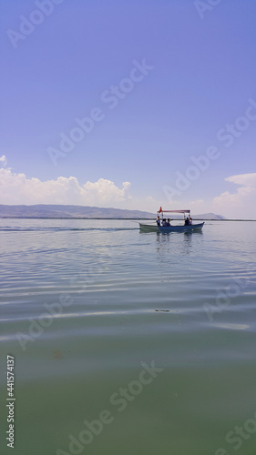 The beautiful landscape of boat floating on the lake