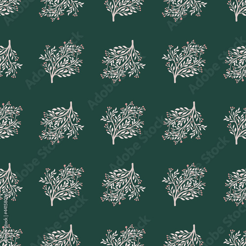 Hand drawn decorative seamless pattern with forest tree silhouettes. Dark green background. Vintage print.