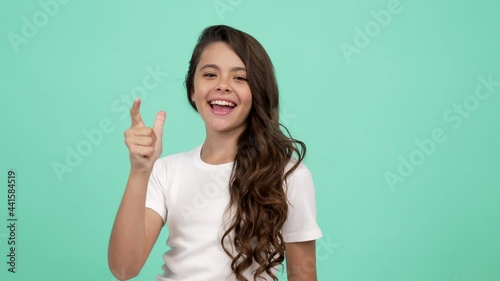 you no me yes, happy selfish kid pointing finger on camera and then thumb up on herself, selfishness