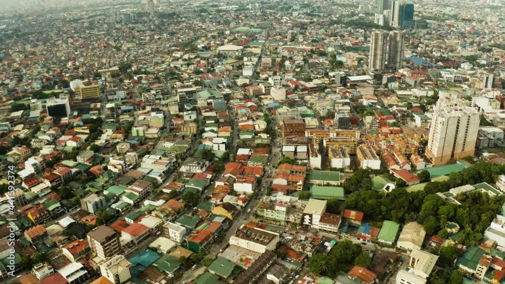 The city of Manila with density buildings, streets and roads from above. Travel vacation concept. The city of Manila with density buildings, streets and roads from above. Travel vacation concept.
