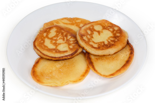 Oladyi or oladky - Eastern European kind of pancakes on dish