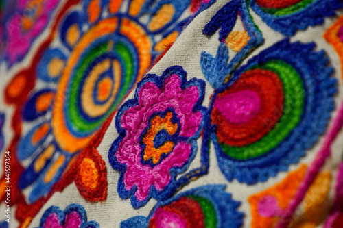 Closeup of colorful embroidered Indian pillowcase