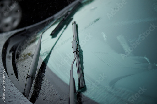 Car windshield wiper in the rain. photo