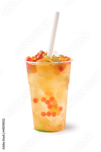 Bubble Tea, Isolated on White Background – Colorful, Fresh Orange Boba Drink with Fruit Fizzy Jellies and Ice Cubes, Wet with Droplets – Close Up Macro on Transparent Plastic Cup, with Straw