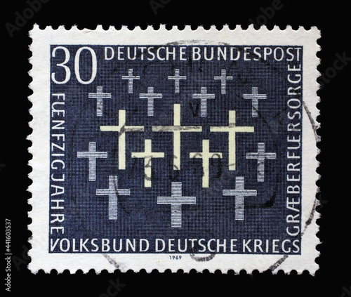 Stamp printed in Germany showing 50th anniversary of the German War Graves Commission, circa 1969 © zatletic