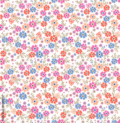 Cute floral pattern. Seamless vector pattern. Elegant template for fashion prints. Small colorful flowers for print. White background. Stock vector.