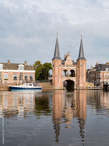 Waterpoort, water gate, and Kolk canal in city of Snits, Sneek in Friesland, Netherlands