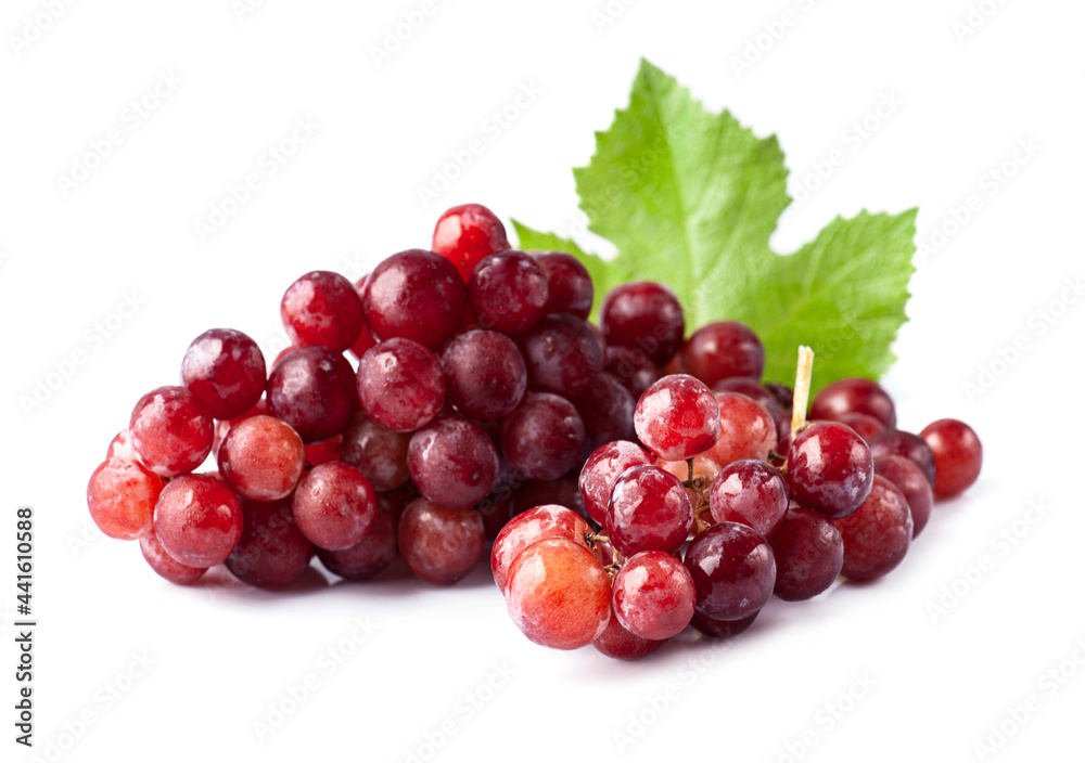 Sweet grapes with leaves on white backgrounds Sweet grapes with leaves on white backgrounds
