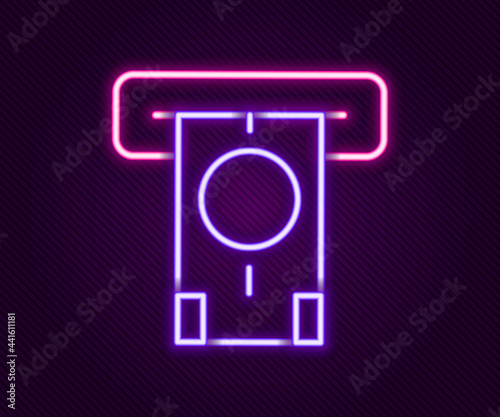 Glowing neon line ATM - Automated teller machine and money icon isolated on black background. Colorful outline concept. Vector
