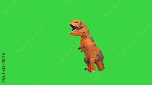 Dinosaur costume doing some funny walking on a Green Screen, Chroma Key.