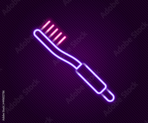 Glowing neon line Toothbrush icon isolated on black background. Colorful outline concept. Vector