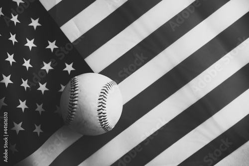 Photography July 4th holiday sports background with baseball on retro black and white American flag