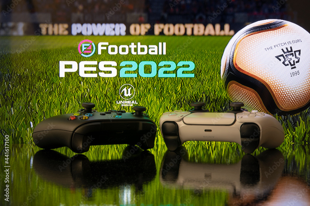 Xbox Series and Playstation 5 controller with PES 2022 at background. 25  Jun, 2021, Sao Paulo, Brazil Stock Photo | Adobe Stock