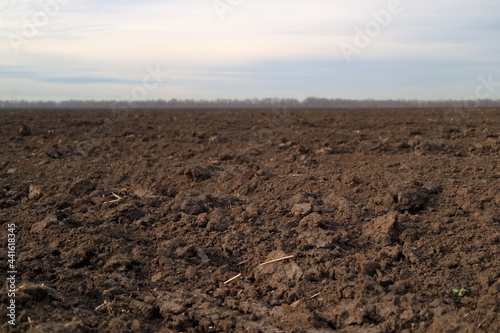 Treated soil. Land for planting agricultural plants. Background.