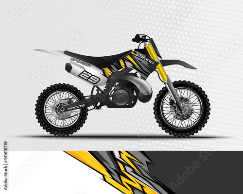Motocross motorcycle wrap decal and vinyl sticker design with abstract background.