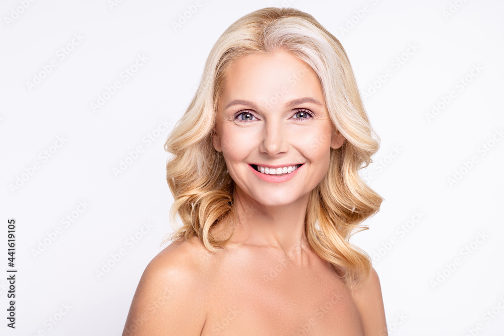 Profile side photo of senior woman happy positive smile hydration moisturizing isolated over grey color background Profile side photo of senior woman happy positive smile hydration moisturizing isolated over grey color background