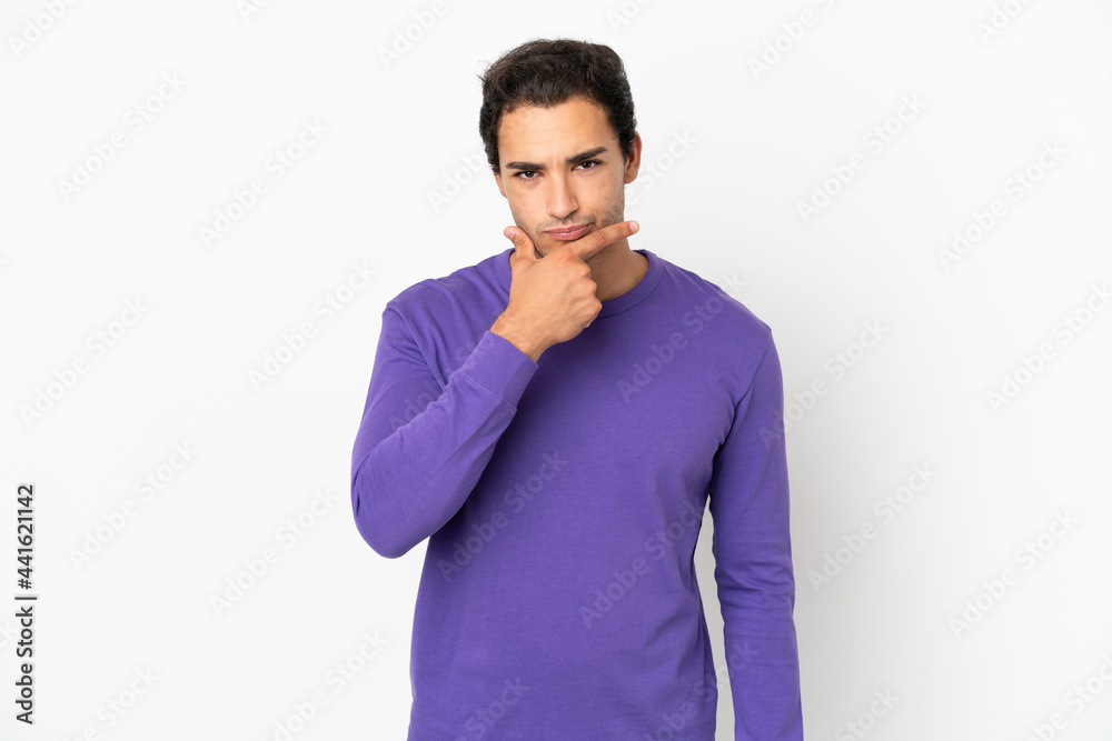 Fototapeta premium Caucasian handsome man over isolated white background thinking