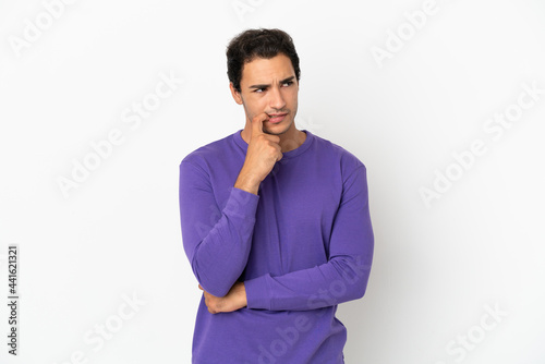 Caucasian handsome man over isolated white background nervous and scared © luismolinero
