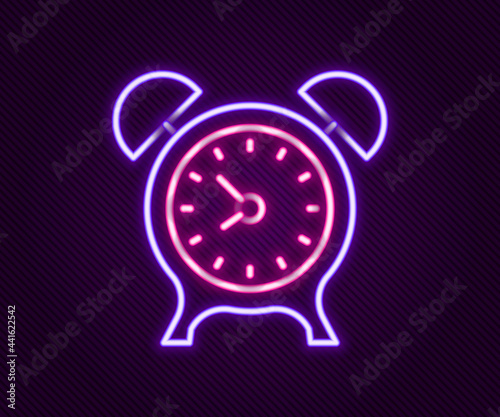 Glowing neon line Alarm clock icon isolated on black background. Wake up, get up concept. Time sign. Colorful outline concept. Vector
