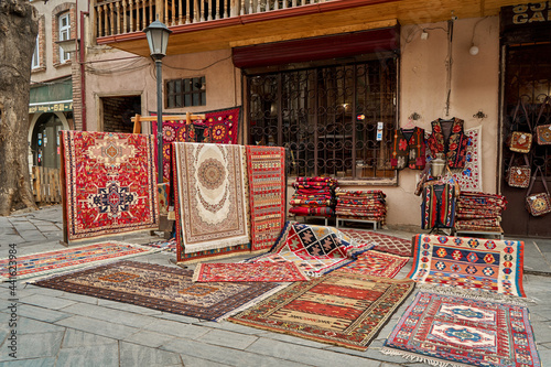 Street counter of traditional carpets on the street in Tbilisi