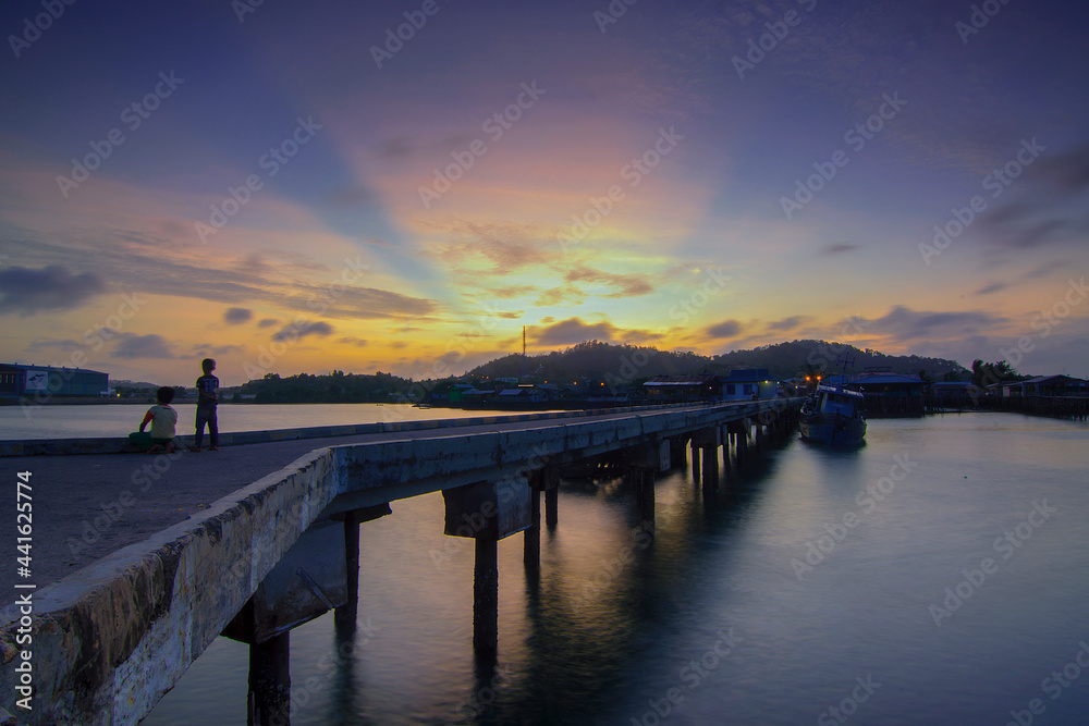 Amazing ROL (ray of light) at the traditional village pier of Tanjung Riau, Batam island