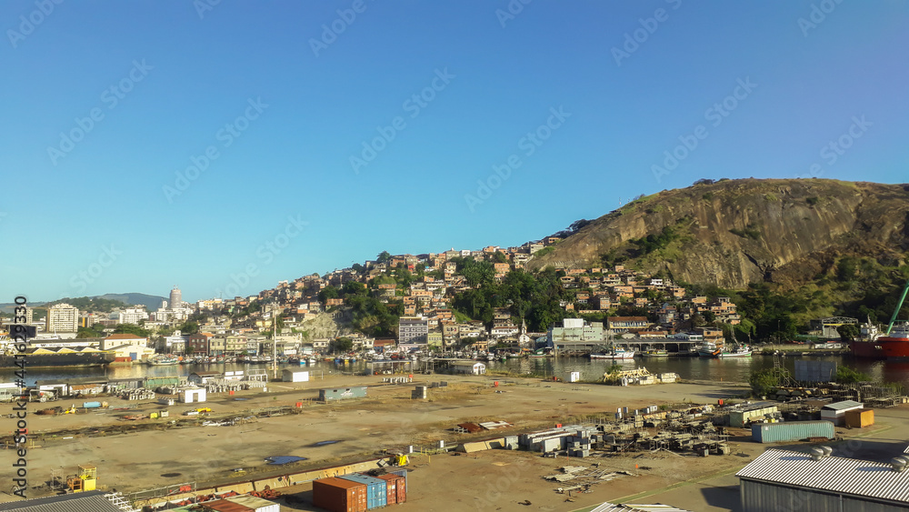 favela (slum) next to port area in Guanabara Bay in Niteroi, Rio de Janeiro, Brazil
