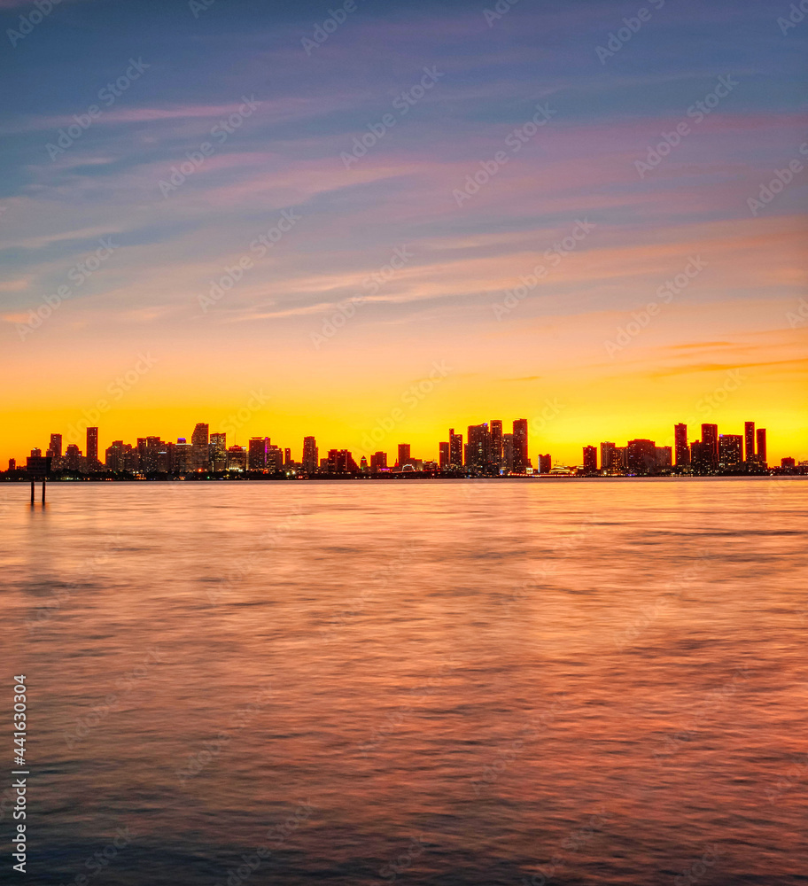 sunset in the city skyline miami florida usa sky colors beautiful cute silhouette buildings skyscrapers travel vacation sea 