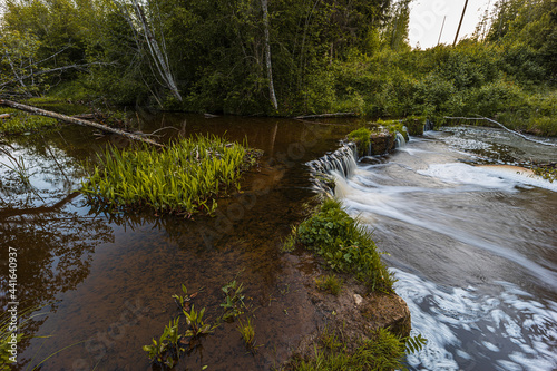 Beautiful running waterfall in the middle of the forest