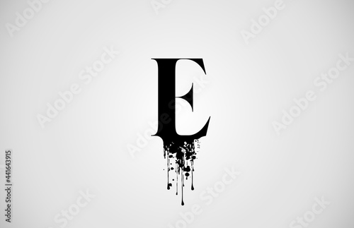Vintage E alphabet letter logo for business and company with black color ink. Corporate brading and lettering icon with grunge splash design