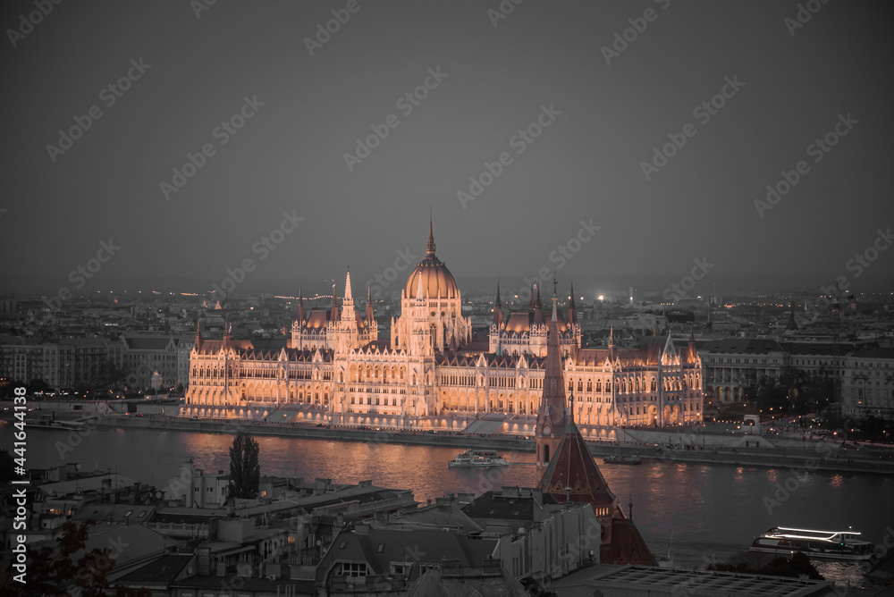 Budapest's majestic parliament lighting up the night.