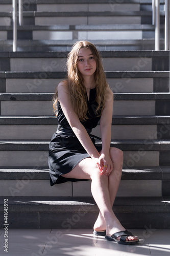 Canvastavla Vertical full-length view of beautiful teenaged girl with long dirty blond hair