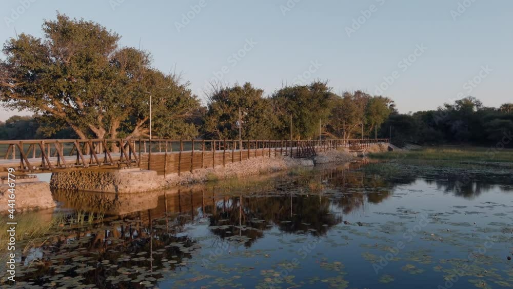 Aerial close-up view of the restored old Matlapaneng bridge across the Thamalakane River in Maun, Botswana Aerial close-up view of the restored old Matlapaneng bridge across the Thamalakane River in Maun, Botswana