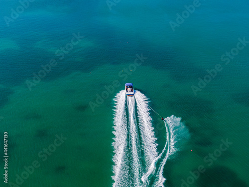 Water skier in the bay in corfu island © ernestos
