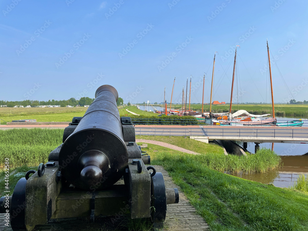 Cannon on a hill in the city Sloten