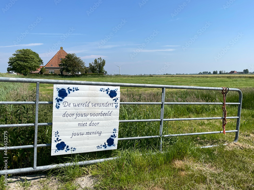 Quote board on a farm fence around Nijhuizum