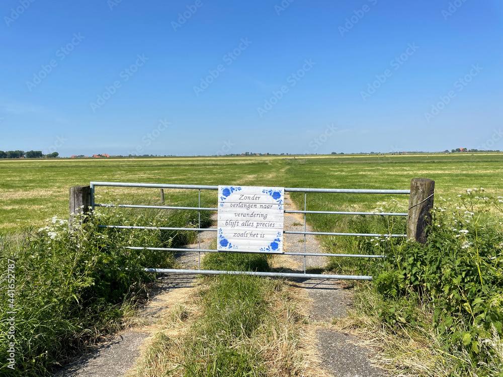 Quote board on a farm fence around Nijhuizum