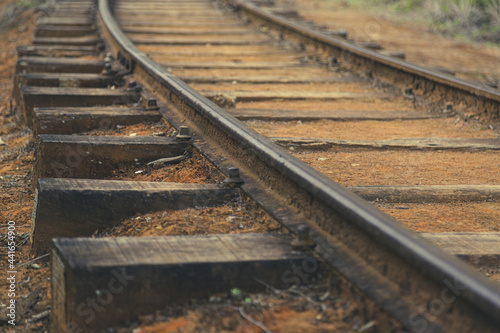 Closeup of old railway tracks photo