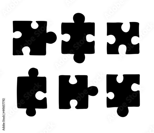 Vector set bundle of hand drawn doodle sketch puzzle piece silhouette isolated on white background