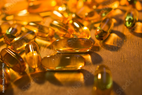 capsules on a wooden table