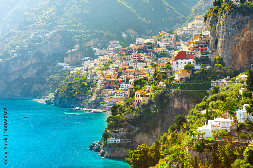 Morning view of Positano cityscape on coast line of mediterranean sea, Italy