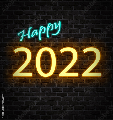 illuminated New Year 2022 neon marquee on dark brick background