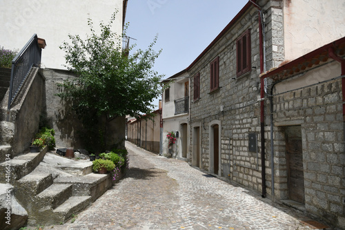 Fototapeta Naklejka Na Ścianę i Meble -  A small street between the old houses of Poggio del Sannio, a medieval village in the Molise region.