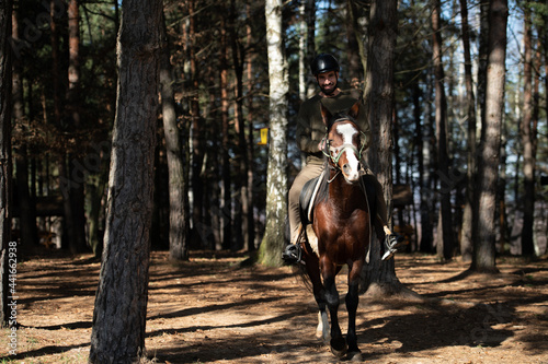 Young Man Riding a Horse © Jale Ibrak