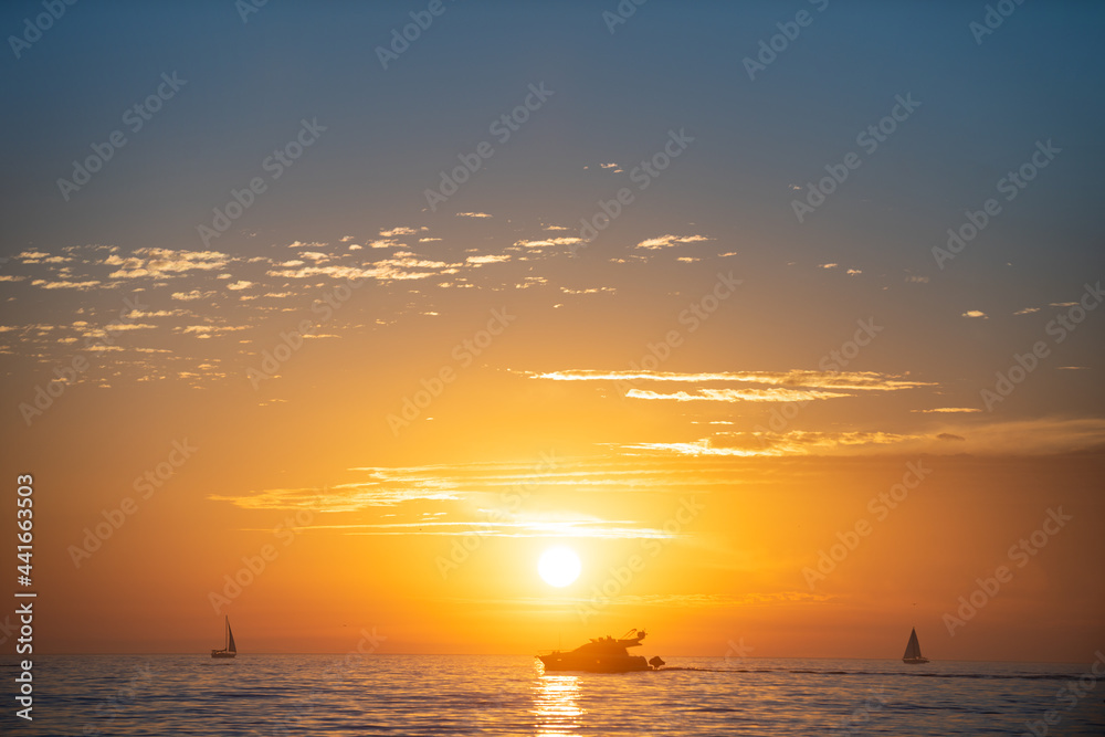 Beautiful sunrise, sun, blue sky with cloud and the sea landscape, miami.