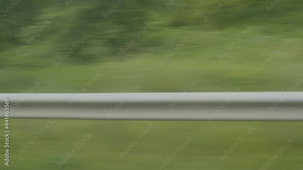 Movement of the roadside from the car window. The movement of transport ...