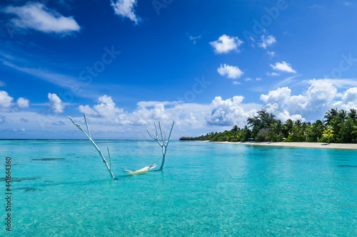 Relaxing hammock in lagoon of South Ari Atoll, Maldives