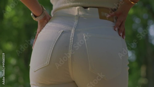 Beautiful female ass in white jeans.Red Helium 8K