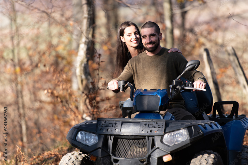 Friends Are Riding on Atv Outdoor