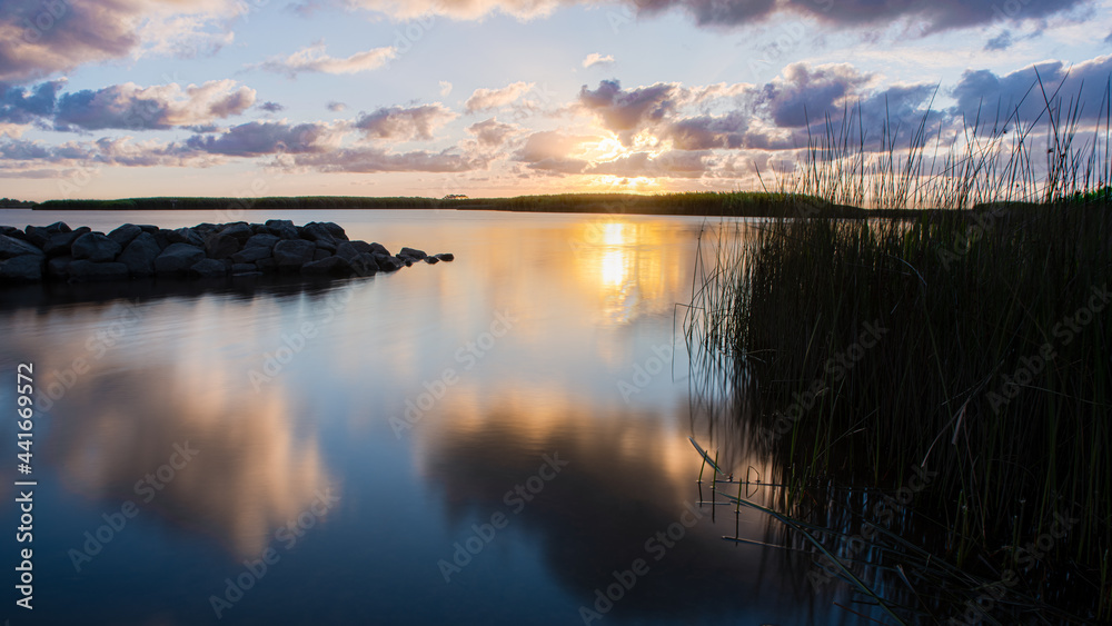 A Peaceful sunset along the coastal wetlands at the Back Bay Wildlife Refuge in Virginia Beach